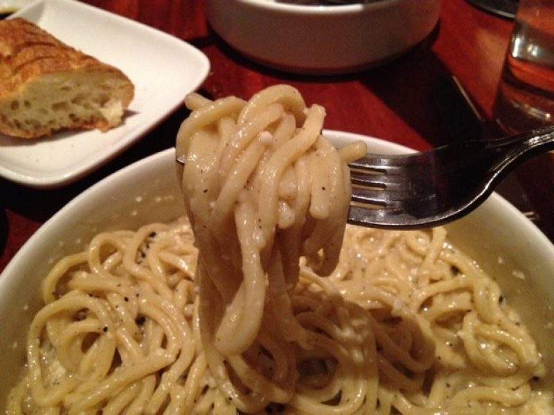 Cheesy noodles on a fork